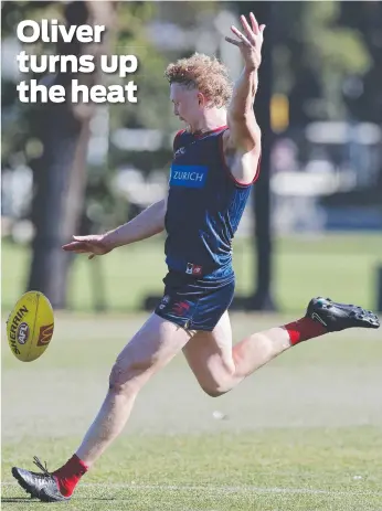  ?? ?? Clayton Oliver unleashes a kick at Melbourne training at Gosch’s Paddock. Picture: Michael Klein