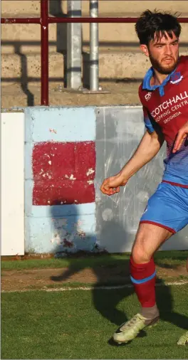  ??  ?? Drogheda United’s Adam Wixted tries to shake off Derry City left-back Dean