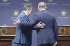  ?? — AFP ?? German Foreign Minister Sigmar Gabriel (L) and his Turkish counterpar­t Mevlut Cavusoglu after a press conference in Ankara on Monday.