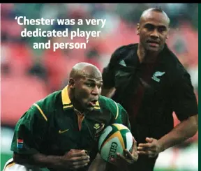  ??  ?? Chester scored the opening try during the TriNations Rugby Union Internatio­nal between the Springboks and the All Blacks at Ellis Park in 2000. Here Chester is seen charging away from New Zealand’s Jonah Lomu during the match. Lomu died in 2015 aged 40.
