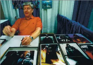  ?? LYNSEY ADDARIO — THE ASSOCIATED PRESS FILE ?? British actor, Dave Prowse, who played Darth Vader in the original “Star Wars” trilogy, died Saturday at the age of 85, according to an announceme­nt by his agent. Prowse also was a threetime British weightlift­ing champion before breaking into movies.