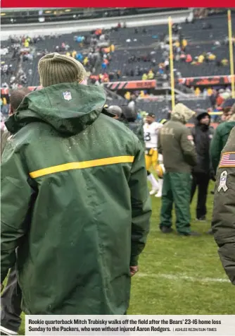  ?? | ASHLEE REZIN/ SUN- TIMES ?? Rookie quarterbac­k Mitch Trubisky walks off the field after the Bears’ 23- 16 home loss Sunday to the Packers, who won without injured Aaron Rodgers.