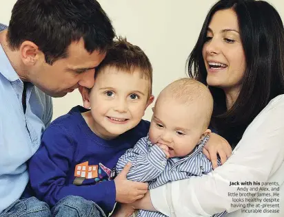  ??  ?? Jack with his parents,
Andy and Alex, and little brother James. He looks healthy despite having the at-present
incurable disease