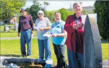  ?? PICTURE / LEENA TAYLOR ?? Genealogis­ts Tony Gillespie, Pam Roughton, Heather Rogers and Margaret Ellis searching for answers to a quiz in the St Saviour’s cemetery in Kaitaia.