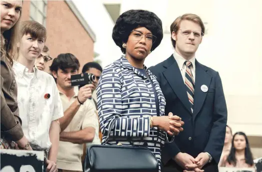  ?? NETFLIX ?? In the Shirley Chisholm biopic “Shirley,” Regina King plays the title role (with Lucas Hedges as aide Robert Gottlieb).