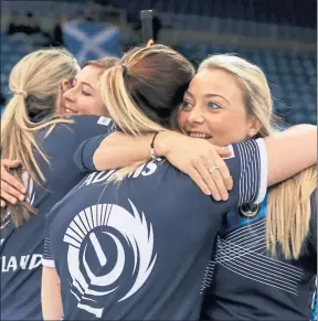  ??  ?? DYNAMIC: Team Muirhead celebrate their world championsh­ip bronze medal.