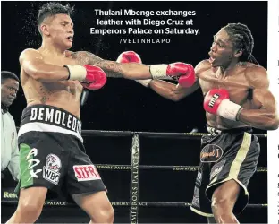  ?? /VELI NHLAPO ?? Thulani Mbenge exchanges leather with Diego Cruz at Emperors Palace on Saturday.