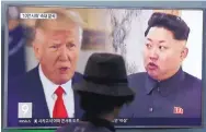  ?? AHN YOUNG-JOON/ASSOCIATED PRESS ?? A man watches a news program Thursday in a train Station in Seoul, South Korea. The screen shows President Donald Trump and North Korean leader Kim Jong Un.