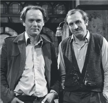  ?? ?? 0
Eric Chappell with star Leonard Rossiter on the Rising Damp set in 1974
