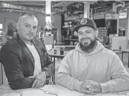  ?? RICK CINCLAIR/TELEGRAM & GAZETTE ?? Julio C. Roque, left, and Kevin Comellas at the Worcester Public Market ahead of the opening of Little Havana.