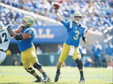  ?? Robert Gauthier Los Angeles Times ?? JOSH ROSEN, throwing against Hawaii, is tied for first in the nation with nine touchdown passes.