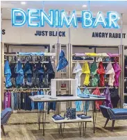  ??  ?? Restock on the classics or update your wardrobe essentials at the Denim Bar and Shoe Wall, located in the ground floor’s Young Contempora­ry Wear department.