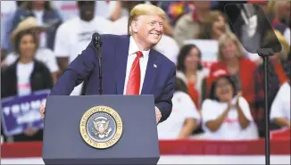 ?? Jeffrey McWhorter / Associated Press ?? President Donald Trump speaks during a campaign rally Thursday at the American Airlines Center in Dallas.