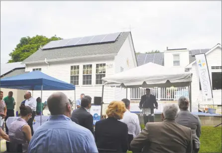  ?? Hearst Connecticu­t Media file photos ?? Bryan Garcia, president and CEO of the Connecticu­t Green Bank, speaks at a home in Bridgeport that was one of the first in Connecticu­t to install solar power and other energy-efficiency measures as part of an incentive program.