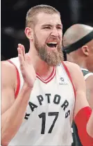  ?? ASSOCIATED PRESS FILE PHOTO ?? Raptors centre Jonas Valanciuna­s reacts after earning a free throw during action against the Brooklyn Nets last month.