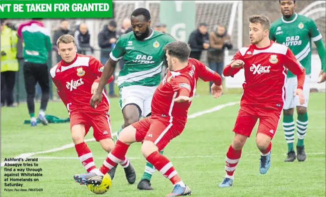  ?? Picture: Paul Amos. FM6470428 ?? Ashford’s Jerald Aboagye tries to find a way through against Whitstable at Homelands on Saturday