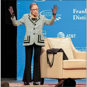  ?? Arkansas Democrat-Gazette/JOHN SYKES JR. ?? U.S. Supreme Court Justice Ruth Bader Ginsburg greets the cheering crowd Tuesday evening at Verizon Arena in North Little Rock.