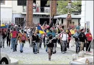  ?? AP/FERNANDO LLANO ?? Dozens of government supporters set up a picket outside the National Assembly, heckling lawmakers during a special session coinciding with Venezuela’s independen­ce day on Wednesday in Caracas.