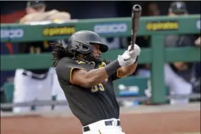  ?? THE ASSOCIATED PRESS ?? In this July 22, 2020, file photo, Pittsburgh Pirates’ Josh Bell bats during an exhibition baseball game against the Cleveland Indians in Pittsburgh. The Pirates traded the slugging first baseman to Washington on Thursday, Dec. 24, 2020, for pitching prospects Will Crowe and Eddy Yean.