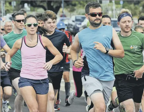  ?? Picture: Ian Hargreaves (150619-03) ?? ON THEIR WAY Hollie Smith, left, made her Southsea parkrun debut on Saturday morning. The Stubbingto­n Green athlete clocked 20min 23sec for 15th overall. Lawrence Craddock, right, was 19th in 20.52 as he continued his comeback from an Achilles injury