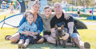  ?? Picture: JERAD WILLIAMS ?? Natalie McAvoy with Kerys, 5, Liam, 10, and Adrian Hughes holding Rocky.