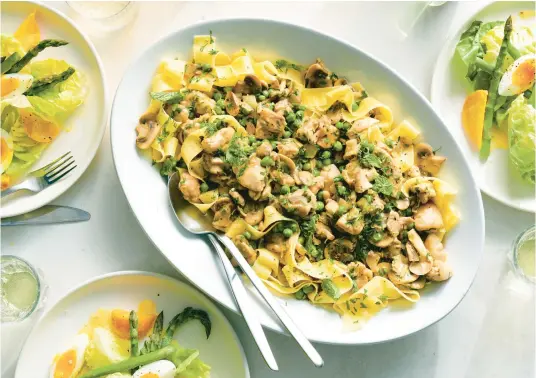  ?? DAVID MALOSH/THE NEW YORK TIMES PHOTOS ?? Spring chicken with mushroom and lemon, center, is surrounded by asparagus and golden beet salad. This dinner has all the best of spring.