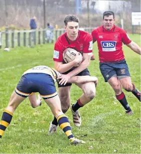  ?? ?? To the four Ruaridh Stewart bagged four tries for Linlithgow (Pics: Graham Black)