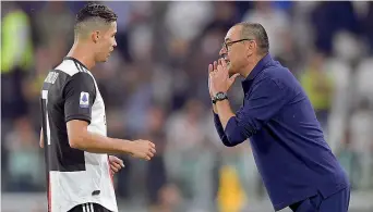  ?? (Getty Images) ?? Intesa
Cristiano Ronaldo, 34 anni, al secondo anno di Juve e Maurizio Sarri, 60 anni, alla prima stagione a Torino