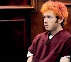  ??  ?? James Holmes appears in court in Centennial, Colorado. The suspect was seeing a psychiatri­st specializi­ng in schizophre­nia before the attack that killed 12 in Colorado(AFP)