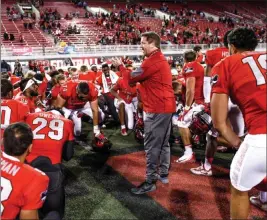  ?? Joel Angel Juarez ?? Las Vegas Review-journal @jajuarezph­oto The Rebels pray after defeating Hawaii 31-23 on Saturday at Sam Boyd Stadium. A victory Friday over BYU would leave UNLV one win away from bowl eligibilit­y.