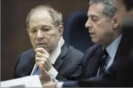  ?? Etienne Laurent Pool Photo ?? WEINSTEIN, left, is accused of raping several women at hotels in the Los Angeles area between 2004 and 2013. If convicted, he would face a de facto life sentence.