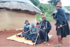  ?? ?? Heir apparent . . . Mr Masawi and his family at the shrine on the foot of Mbewe Mountain Range in Mazowe