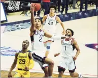  ?? David Butler II / Associated Press ?? UConn guard James Bouknight (2) handles the ball against Marquette on Feb. 27 in Storrs.