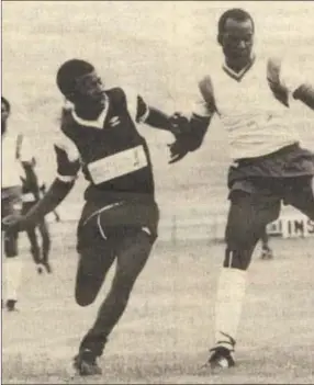  ??  ?? The Copper Beast... Shomeya (right), tussles for ball possession with Black Africa’s tireless pocket-sized midfield workaholic Carpio Kauendji, during the Metropolit­an Life Cup final at the Windhoek stadium in 1987. Benfica won the tie on penalties following an energy sapping goalless (0-0) stalemate after extra time. Shomeya marked the hell out of BA’s danger man Dawid Snewe in that particular match.