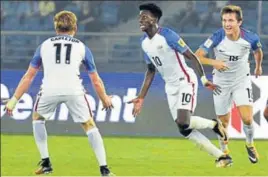  ?? MOHD ZAKIR/HT PHOTO ?? US forward Tim Weah (centre), who scored a hattrick against Paraguay in the Round of 16, will pose problems for the England defence during their quarterfin­al in Margao on Saturday.