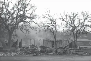  ?? Marcio Jose Sanchez/AP ?? Fire: Paramount Ranch, where a number of Hollywood westerns have been filmed, is seen after it was decimated by a wildfire Friday in Agoura Hills, Calif.