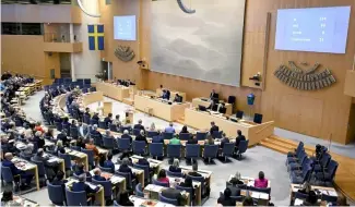  ?? ?? A view of the Swedish Parliament as lawmakers vote on the new gender identity law, in Stockholm, Wednesday, April 17, 2024.