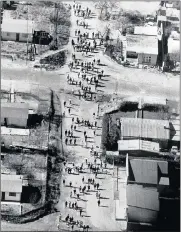  ??  ?? FIRE WAS LIT: An aerial view of the people of Soweto marching to Johannesbu­rg, on June 24, 1977, a year after the pupil protest that horrified the world. PICTURE: ALAN COXON/AFRICAN NEWS AGENCY (ANA)