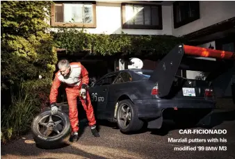  ??  ?? CAR-FICIONADO Marziali putters with his modified '99 BMW M3
