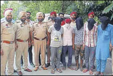  ?? SANJEEV KUMAR/HT ?? The 5 accused in Bathinda police custody on Saturday. Police claim to have solved 21 cases of robbery with the arrests.