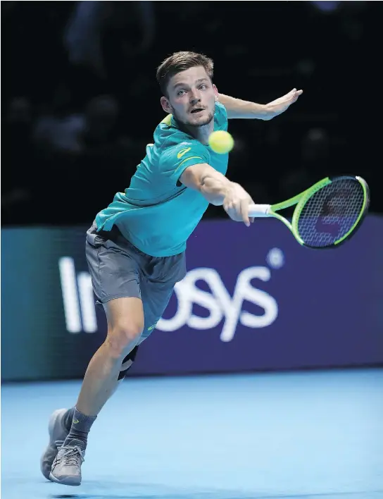  ?? — GETTY IMAGES ?? Belgium’s David Goffin plays a backhand in his match against Roger Federer in the semifinals during Day 7 of the Nitto ATP World Tour Finals at London’s O2 Arena on Saturday. Goffin faces Bulgaria’s Grigor Dimitrov in Sunday’s final.