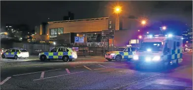  ?? Pictures: REUTERS ?? DEADLY BOMBING: Police vehicles are seen outside the Manchester Arena, where US singer Ariana Grande had been performing, in Manchester, northern England, Britain on Monday