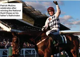  ??  ?? Patrick Mullins celebrates after winning the National Hunt Chase on his father’s Rathvinden