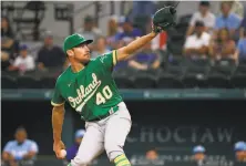  ?? Ray Carlin / Associated Press ?? A’s starter Chris Bassitt, a firsttime AllStar, held the Rangers to one run over seven innings in a 41 win in Arlington, Texas.