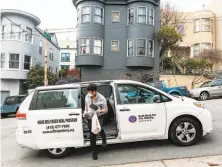  ?? Nick Otto / Special to The Chronicle ?? Benny Tan delivers a meal to a senior in San Francisco. Having food delivered helps seniors avoid coronaviru­s exposure.