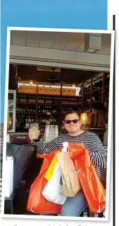  ??  ?? Bags me a drink: Our Eoin refuels after all his shopping at Woodbury Common