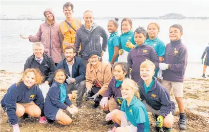  ??  ?? Eugenie Sage (centre) and David Parker (middle row left) with members of the trial collection group at Okahu Bay.