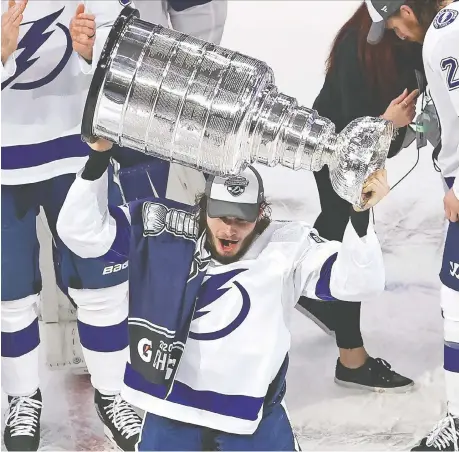  ?? BRUCE BENNETT/GETTY IMAGES FILES ?? After winning a Memorial Cup with the Spitfires, Mikhail Sergachev hoisted the Stanley Cup last year.