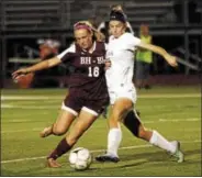  ?? STAN HUDY - SHUDY@DIGITALFIR­STMEDIA.COM ?? Burnt Hills-Ballston Lake’s Cassidy Karl looks to hold off Scotia-Glenville’s Tany Leggiero Monday night during the Section II Class A girls soccer semifinal at Stillwater High School.