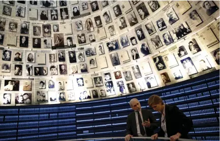  ?? (Reuters) ?? OUTGOING US AMBASSADOR to the United Nations Samantha Power (right) visits the Hall of Names at Yad Vashem's Holocaust History Museum in Jerusalem last February.